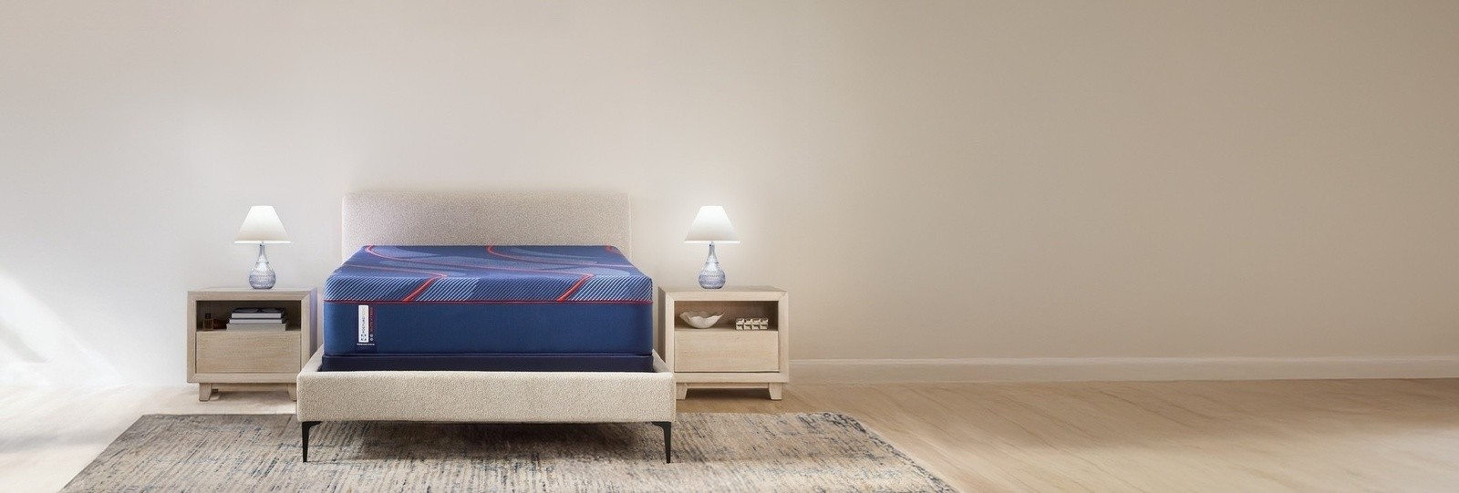 A Posturepedic Elite Sealy Hybrid mattress in a styled room