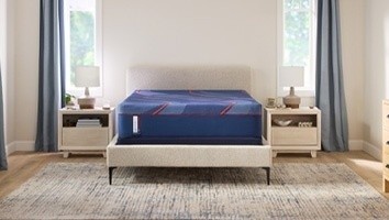 A Posturepedic Elite mattress in a styled room - medium hero