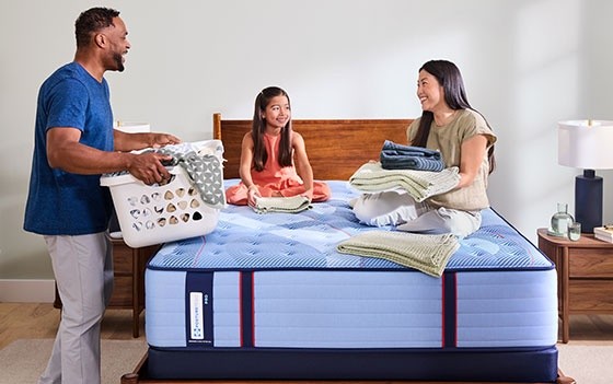 Posturepedic Pro with a family on it